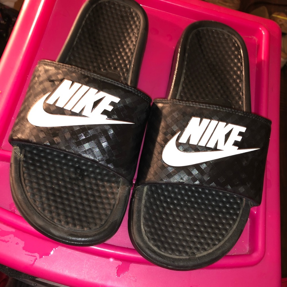 Women Nike slides.
